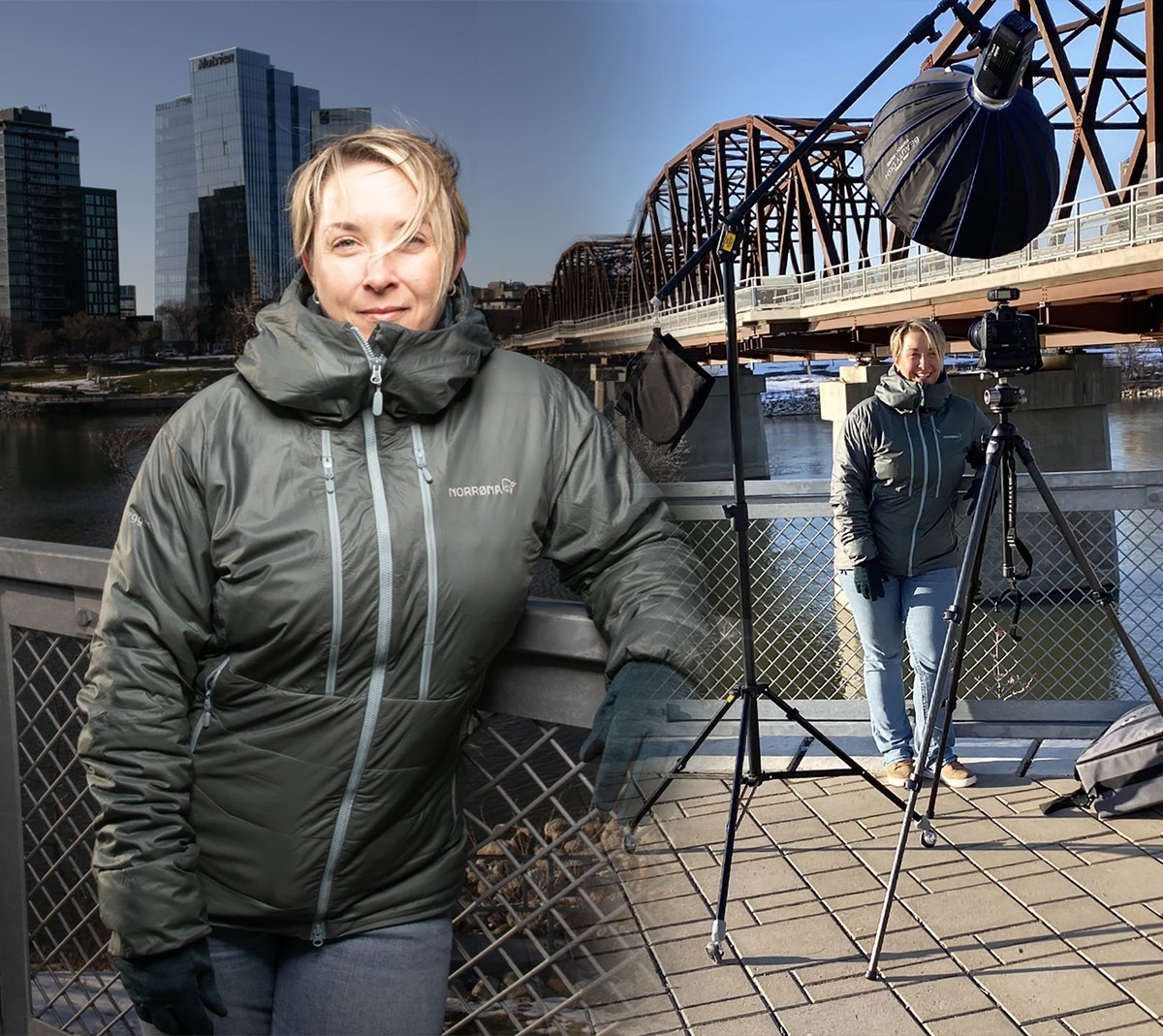 Photographer on location by a bridge