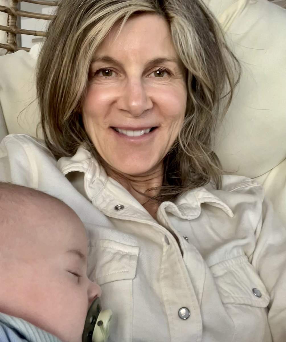 Woman holding a sleeping baby