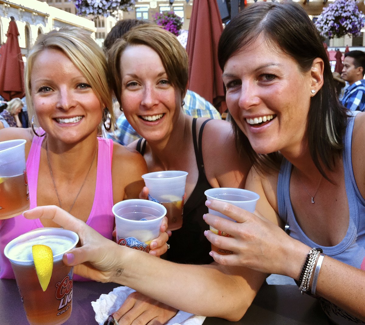 Three friends at an outdoor festival